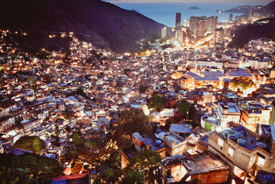 High angle view of illuminated cityscape at night