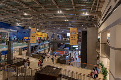 Group of people working in shopping mall
