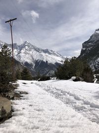 Snow covered mountain against sky