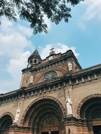 Low angle view of historical building against sky