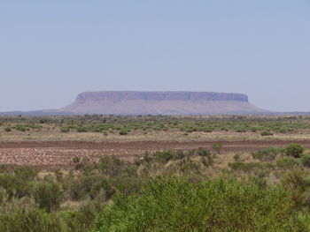 Scenic view of land against clear sky