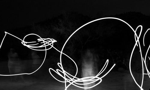 Close-up of art over black background