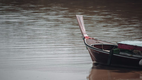 High angle view of boat moored in lake