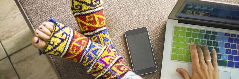 High angle view of woman using mobile phone