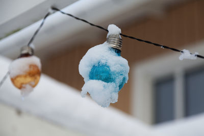 Low angle view of ice cream hanging on snow