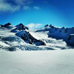 Scenic view of snow covered mountains