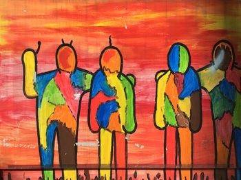 Close-up of colorful graffiti on wall