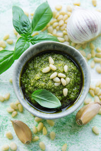 Fresh made pesto sauce. green basil pesto. ingredient for pesto sauce