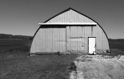 Agricultural storage hut holland marsh, ontario, canada photographed one front of a clear sky.