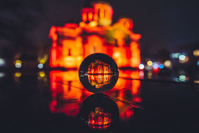 Close-up of illuminated lighting equipment at night