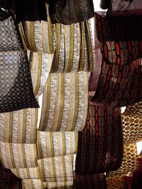 Close-up of clothes hanging for sale