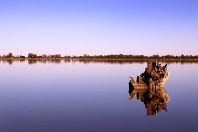 Scenic view of lake against clear sky