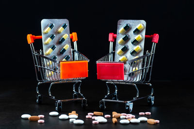 Close-up of multi colored candies against black background