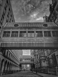 Low angle view of bridge against cloudy sky part of the beautiful manchester town