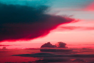 Scenic view of sea against romantic sky at sunset