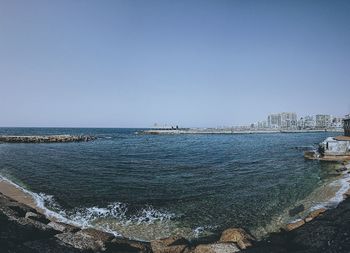 Scenic view of sea against clear sky