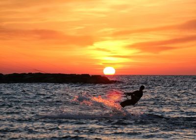Scenic view of sea at sunset