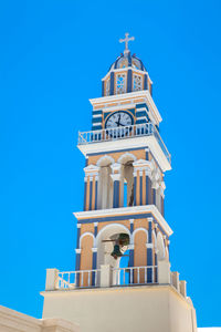 Bell tower of the saint john the baptist church in the city of fira in the island of santorini