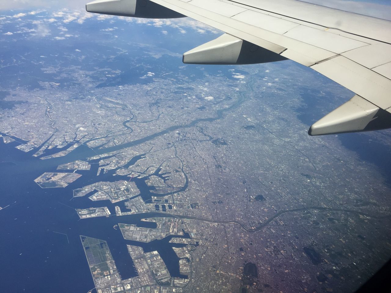 transportation, airplane, mode of transport, air vehicle, aircraft wing, aerial view, flying, part of, cropped, travel, journey, mid-air, landscape, public transportation, vehicle part, on the move, airplane wing, aeroplane, aircraft, commercial airplane