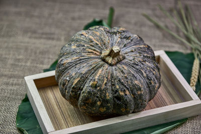 Pumpkin on a wooden tray