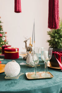 Table served for christmas dinner in living room, close-up view, table setting, christmas
