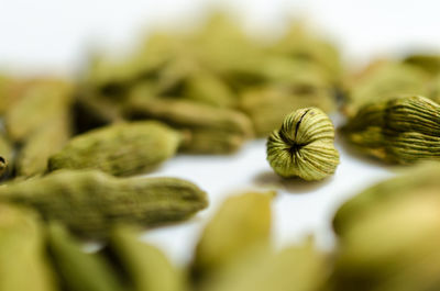 Close-up of cardamoms on table