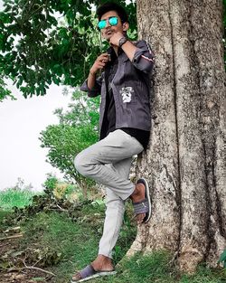 Full length of young man standing on land