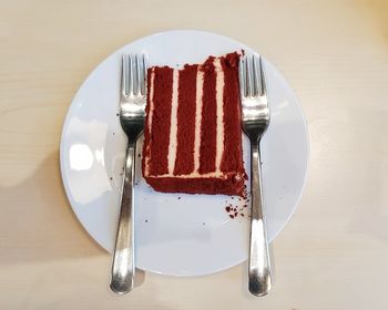 High angle view of cake in plate on table
