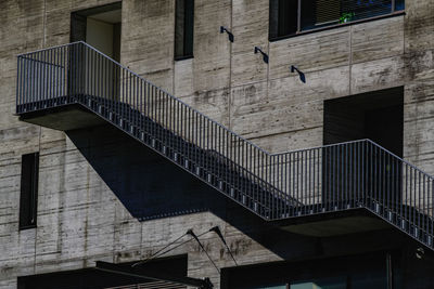 Building with shadowed outer stairs