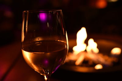 Close-up of wineglass on table