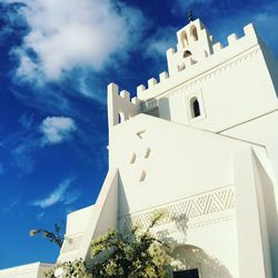 Low angle view of church against blue sky