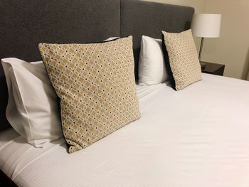 High angle view of empty seats on bed at home