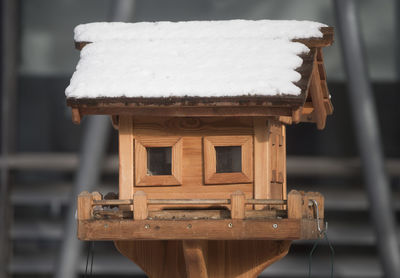 A building or house in wood construction or timber construction in winter