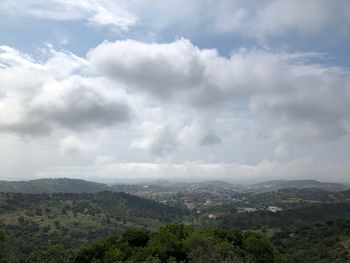 Aerial view of townscape against sky