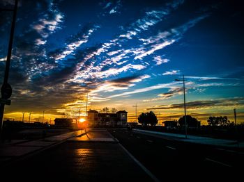 Road against sky at sunset