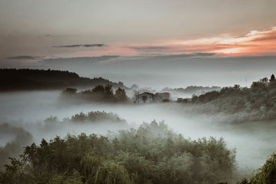 Scenic view of landscape against sky during sunset