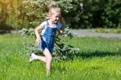 Full length of girl on field