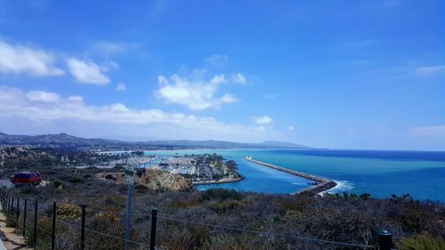 Scenic view of sea against blue sky