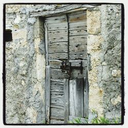 Brick wall with closed door