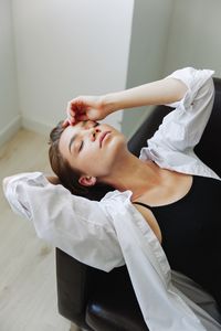 Midsection of doctor examining patient at clinic