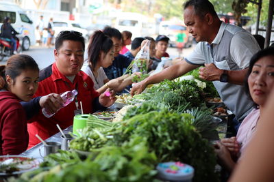 Group of people at market