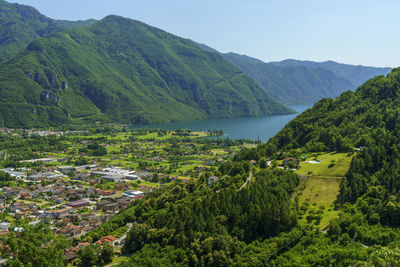 Scenic view of landscape and mountains against sky