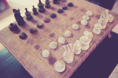 High angle view of chess pieces on table