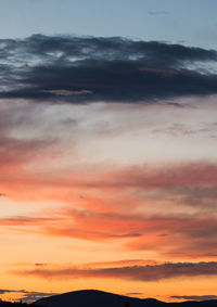 Low angle view of dramatic sky during sunset