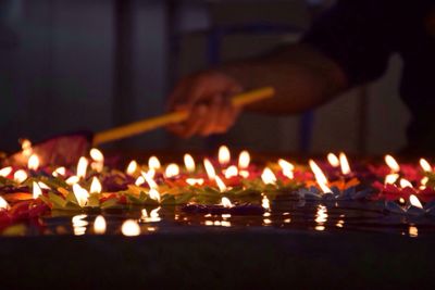 Close-up of illuminated candles