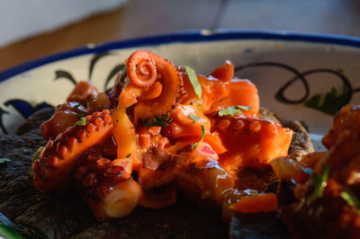 Octopus ceviche on blue corn tostadas, mexican seafood dish