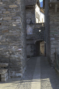 Alley amidst buildings in city