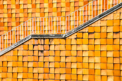 Full frame shot of yellow staircase against building