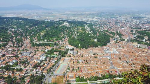 Aerial view of cityscape against sky