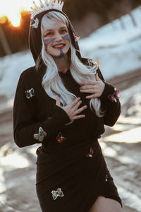 Portrait of smiling young woman